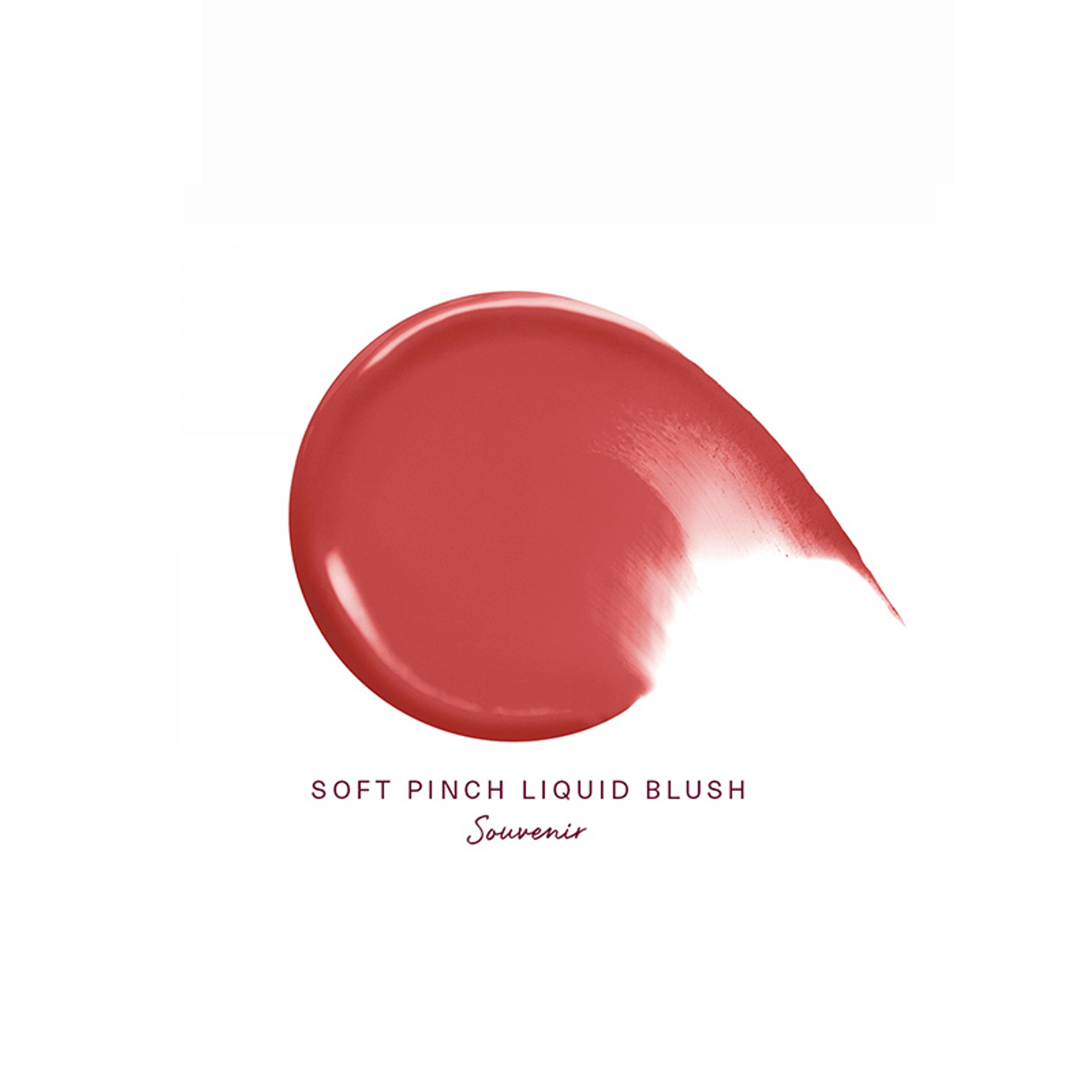 A swatch of Rare Beauty Soft Pinch Liquid Blush in the shade Souvenir, shown as a glossy rosy-red smear on a white background. Text below identifies the product and shade.