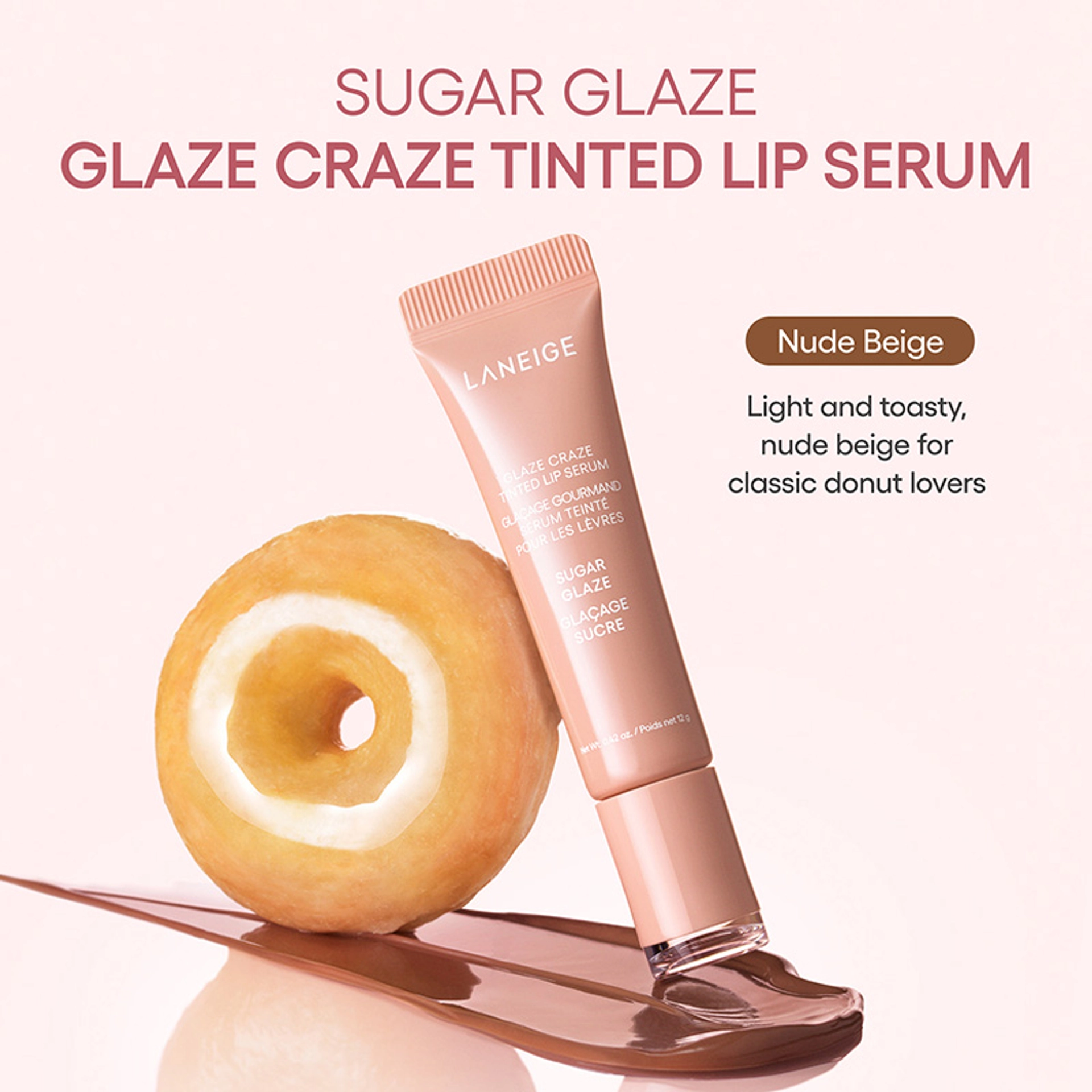 A Laneige Glaze Craze Tinted Lip Serum in Sugar Glaze, Nude Beige, displayed beside a glazed donut against a pale pink background. Text describes the shade as a light, toasty nude beige for classic donut lovers.